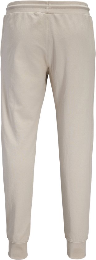 Beige joggingbroek met elastische tailleband en boorden.