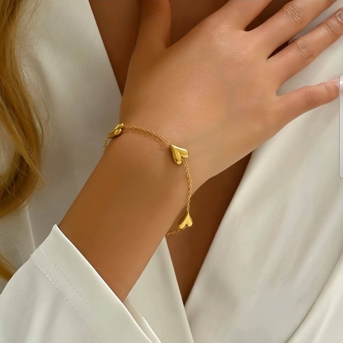 Nalovi Armband Dames met Meerdere Hartjes - Verstelbare Schakelarmband met 3D Hart Bedels - 17 + 6,5 cm - Roestvrij Staal - Goudkleurig