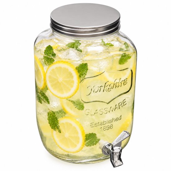 Glazen drankdispenser gevuld met water, citroen, munt en ijs, met verchroomd kraantje.