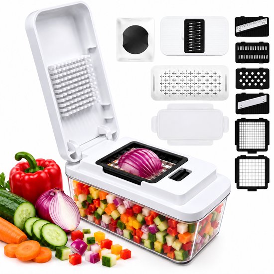 Multifunctionele witte groentesnijder met opvangbak, snijbladen en gesneden groenten zoals paprika, ui en komkommer.