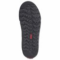 Zwarte zool van een Vans sneaker met een diep profiel en een rood Vans merklogo in het midden.