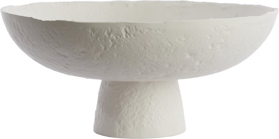 Bol blanc cassé avec une surface texturée sur un pied large.