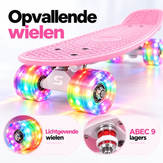 Roze skateboard met opvallende lichtgevende LED-wielen en ABEC 9 lagers voor soepel rijden.