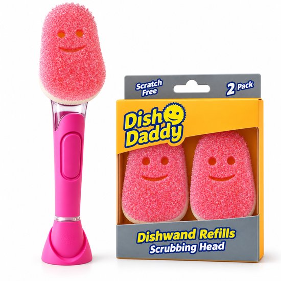 Roze Dish Daddy afwasborstel met een smiley schrobkop en een verpakking van 2 roze reserve schrobkoppen.