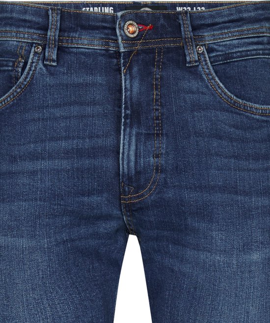 Donkerblauwe Petrol Industries Starling jeans met contrasterende stiksels en metalen knoopsluiting.