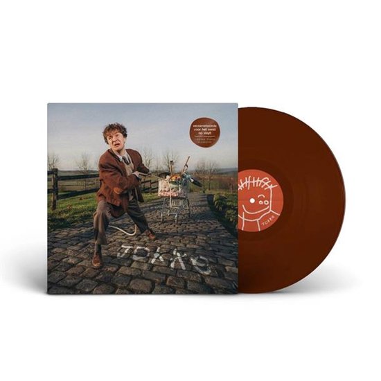 Bruine vinylplaat met hoes waarop een man een winkelwagentje over kasseien trekt. Tekst: Verzamelwoede op vinyl.