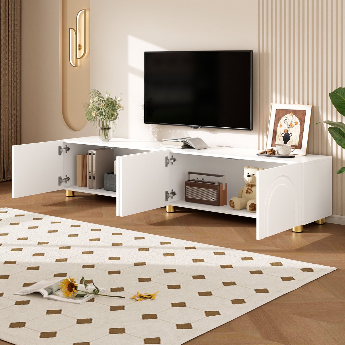 Moderne tv meubel - lage kast - gebogen reliëfdeuren - metalen poten - veel opbergruimte - wit