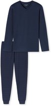 Donkerblauwe pyjamaset: effen V-hals shirt en een broek met een patroon van fijne, verticale streepjes.