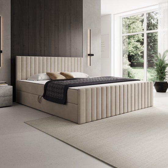 Luxe beige boxspring met opbergruimte, 180x200 cm. Bed met verticale ribbels in de stof.