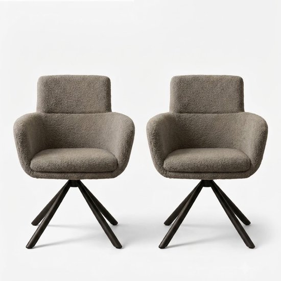Deux chaises de salle à manger en tissu teddy gris anthracite avec des pieds pivotants noirs, sur fond blanc.