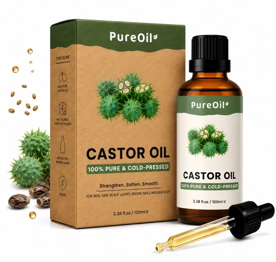 Flesje Castor Oil en bijpassende doos van PureOil. Op de doos staat 'CASTOR OIL 100% PURE & COLD-PRESSED'. Ernaast liggen ricinusvruchten en -zaden.
