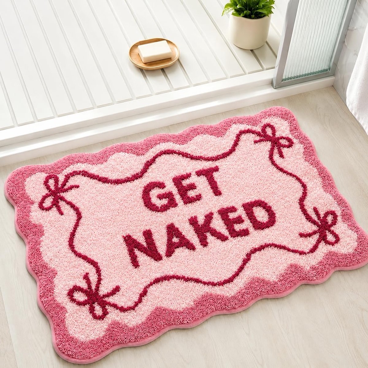Badmat 40x60 cm - Roze strik - Humoristisch ontwerp - Slipvast en absorberend - ShopVlot