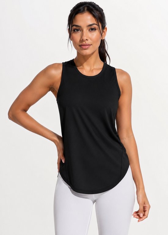 Modèle portant un haut de sport noir avec un legging blanc, vue de face.