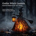 Een heksenfiguur met lantaarn en bezem in een donker bos, met de tekst 'Gothic Witch Lantern'.