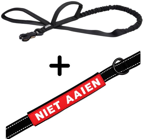 Laisse de chien élastique noire avec boucle et mousqueton. Laisse noire avec texte rouge 'NIET AIIEN'.