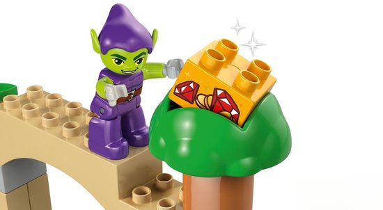 Groene goblin met paarse outfit pakt een gouden blok met diamanten.
