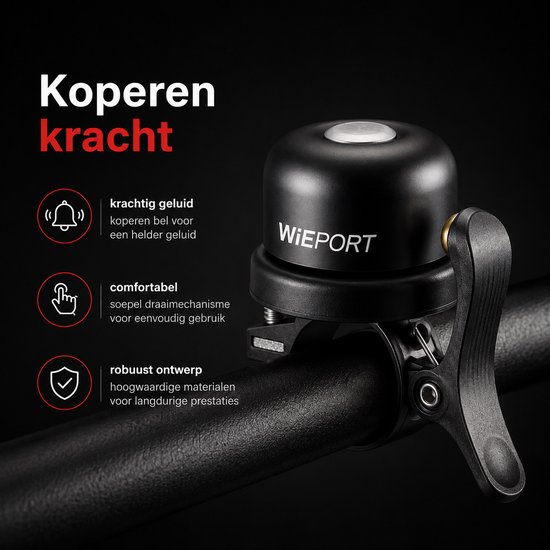 Zwarte fietsbel met zilveren knop op zwart stuur, met tekst "Koperen kracht".