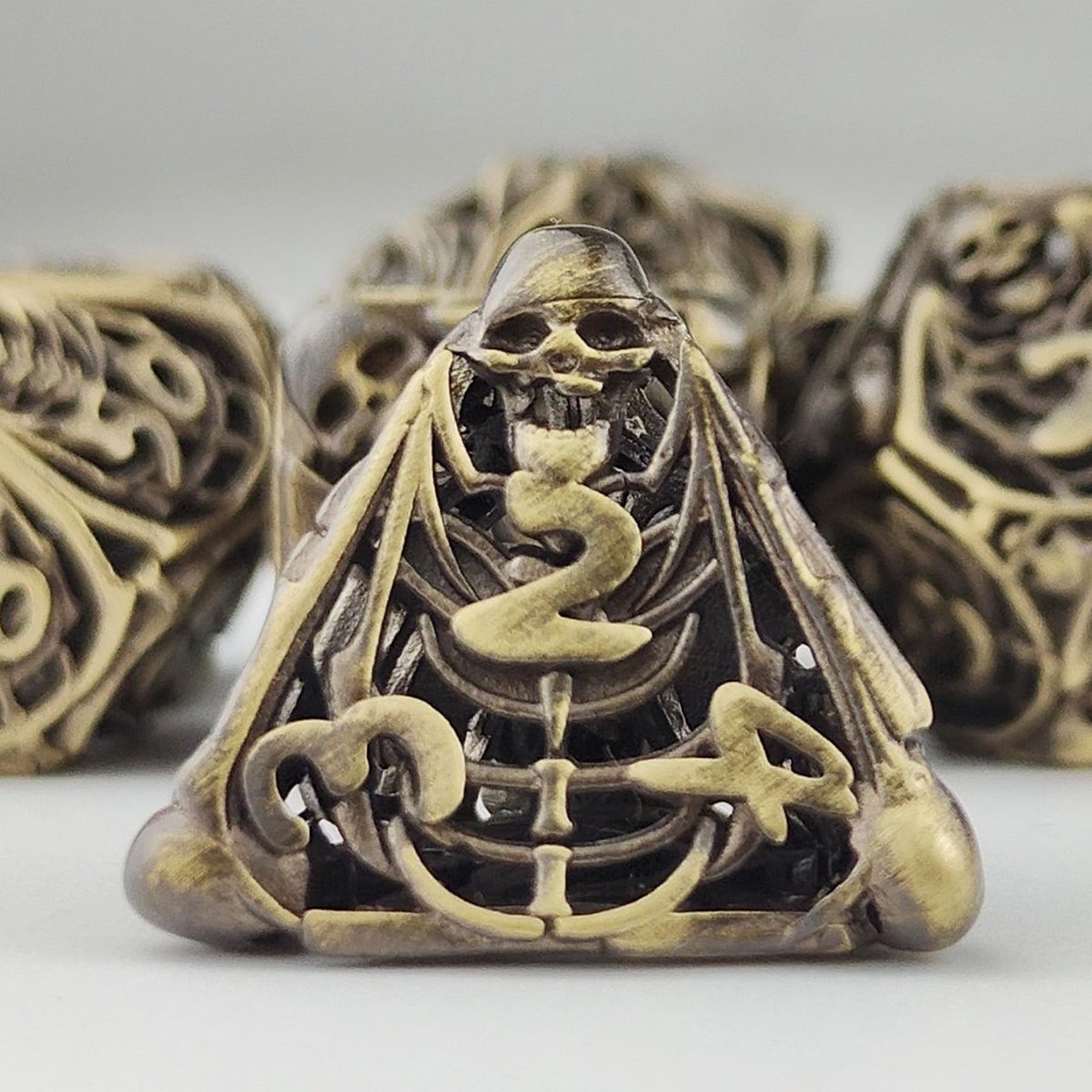 DND dobbelstenen set - 7-delige metalen veelvlakkige dobbelstenen - hollow skull ontwerp - ideaal voor rollenspellen - ShopVlot