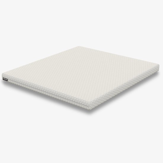 Luxe witte topper met zachte hexagonale structuur en Mörgenn logo.