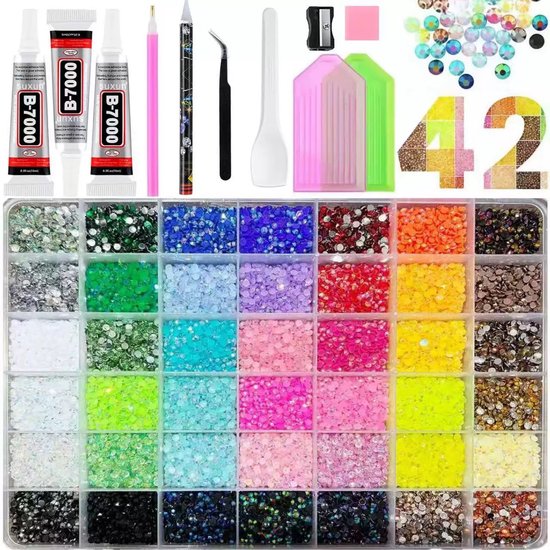 42 kleuren strass steentjes, 3x lijm, pincet, pen, schraper, 2x diamant schilderij platen, 1x puntenslijper en 1x notitieblok.