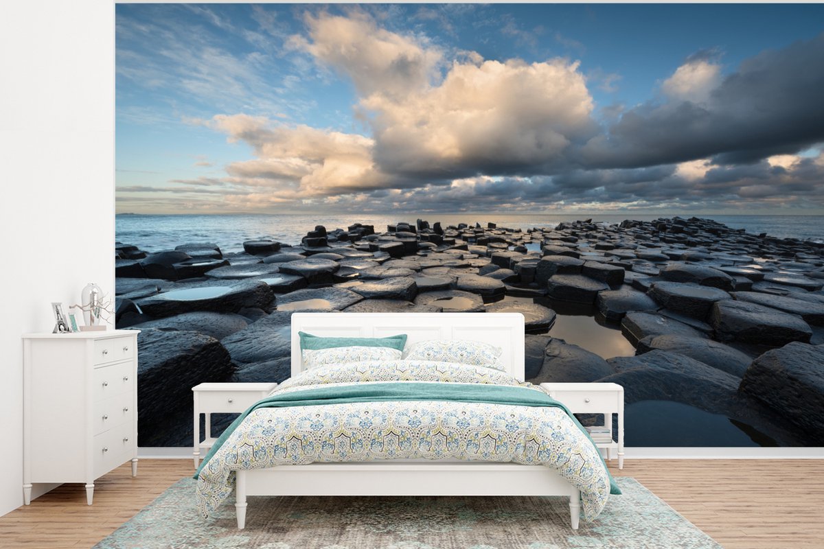 Behang - Fotobehang De Giant’s Causeway - Breedte 350 cm x hoogte 260 cm