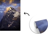 Behang - Fotobehang Bewolkte Eiger bij zonsondergang in Zwitserland - Breedte 175 cm x hoogte 260 cm