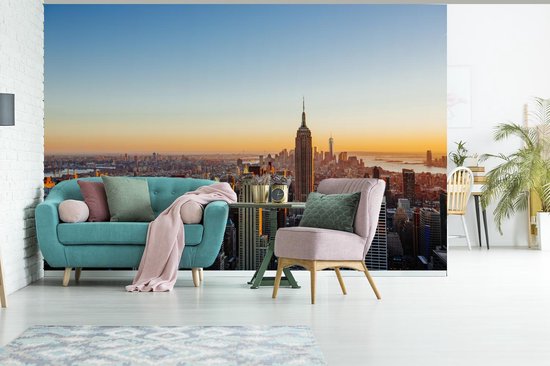Papier peint Papier peint photo en vinyle - Skyline de New York avec un coucher de soleil largeur 390 cm x hauteur 260 cm - Tirage photo sur papier peint (disponible en 7 tailles)