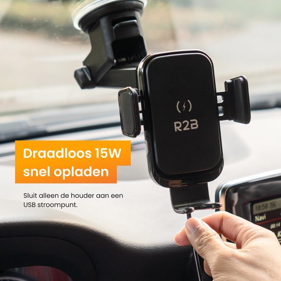 Zwarte R2B telefoonhouder met draadloze 15W snellaadfunctie, aangesloten op een USB-stroompunt. Tekst: "Draadloos 15W snel opladen".