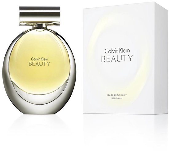 Calvin Klein Beauty Eau de parfum spray, 30 ml. Parfumfles in druppelvorm met zilveren dop, naast een witte kartonnen verpakking.