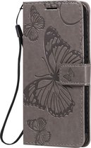 Apple iPhone 12 Hoesje - Mobigear - Butterfly Serie - Kunstlederen Bookcase - Grijs - Hoesje Geschikt Voor Apple iPhone 12