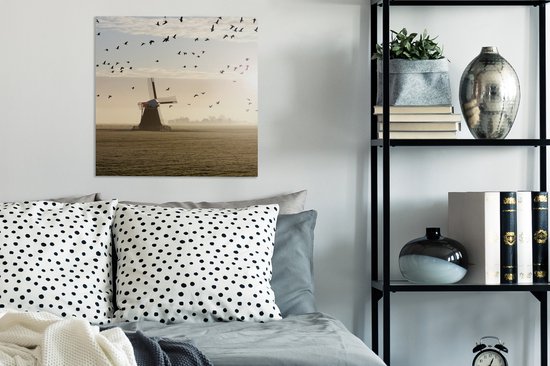 Tableau sur toile Oies au-dessus d'un moulin à vent aux Nederland - 50x50 cm - Décoration murale