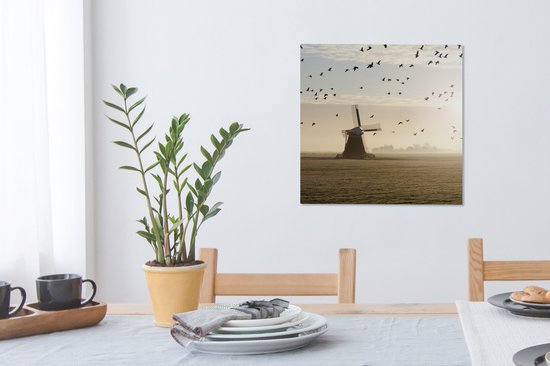 Tableau sur toile Oies au-dessus d'un moulin à vent aux Nederland - 50x50 cm - Décoration murale
