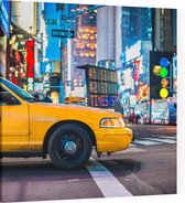 Close-up van een gele taxi op Times Square in New York - Foto op Canvas - 100 x 100 cm