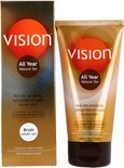 Doos en tube van Vision All Year Natural Tan zelfbruiner met oranje cirkel en tekst.