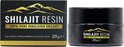 Zwarte doos en pot Shilajit Resin 20g met gouden berg-logo, naast elkaar op witte achtergrond.