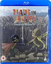 Blu-ray hoes van Made in Abyss - Complete Seizoen 1 met Riko en Reg die elkaar vasthouden met de Abyss op de achtergrond.