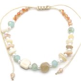 Kralenarmband - touw - verstelbaar - beige - oranje - groen - bruin - vakantie - zomer - zon - strand - tijdloos - accessoire - sieraad