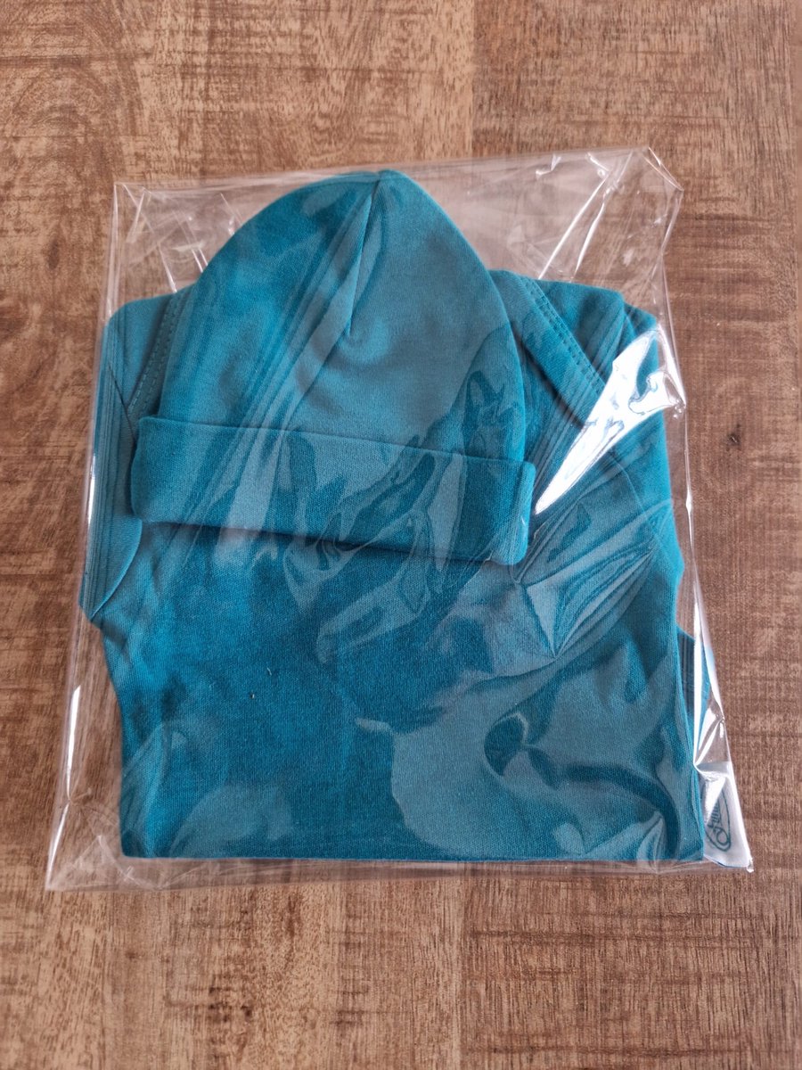 Goedkoopste Turquoise romper met mutsje van Funnies