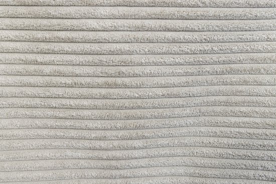 Textuur van een lichtgrijs, geribd materiaal, typisch voor een hondenkussen.