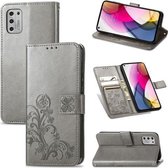Voor Motorola Moto G Stylus 2021 Vierbladige sluiting Reliëfgesp Mobiele telefoonbescherming lederen tas met lanyard & kaartsleuf & portemonnee & beugelfunctie (grijs)