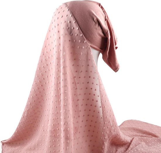 Gedetailleerde foto van de roze hijab met stippenpatroon en een deel van het onderkapje.