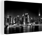 Canvas Schilderij Skyline van New York in de nacht - zwart wit - 90x60 cm - Wanddecoratie