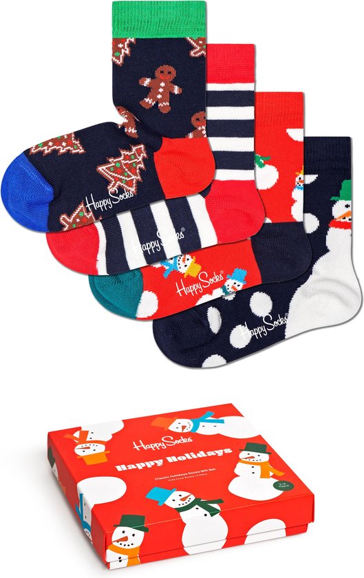 Een set van vier kinder Happy Socks met kerstprints: kerstbomen, gingerbread mannen, gestreept en sneeuwpoppen. Rode geschenkdoos met sneeuwpoppen.