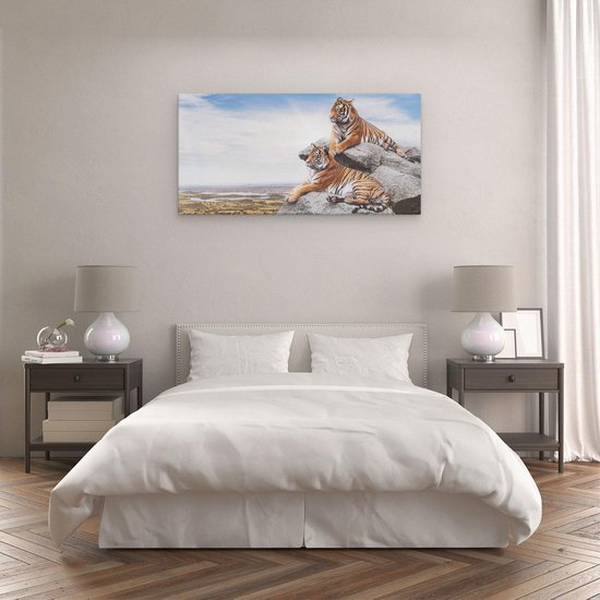 Artaza - Peinture sur toile - Deux tigres sur des rochers avec le ciel bleu - 120 x 60 - Groot - Photo sur toile - Impression sur toile