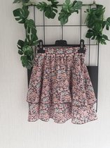 Rok bloemen motief zacht roze134/140