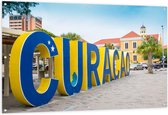 Tuinposter – Curaçao Letters in de Stad - 150x100cm Foto op Tuinposter  (wanddecoratie voor buiten en binnen)