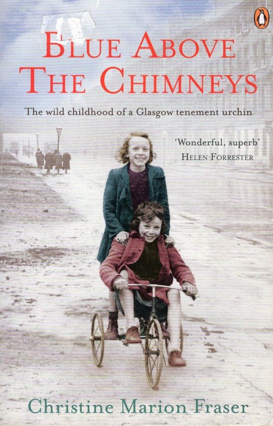 Boekomslag van "Blue Above The Chimneys" met twee lachende kinderen, een meisje op een driewieler en een ander meisje staand achterop. De titel is in rode letters.