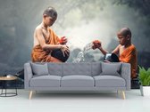 Professioneel Fotobehang Boeddhistische kinderen - oranje grijs - Sticky Decoration - fotobehang - decoratie - woonaccesoires - inclusief gratis hobbymesje - 415 cm breed x 280 cm hoog - in 7