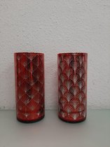 Twee decoratieve houders met licht erin