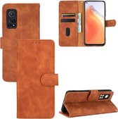 Voor Geschikt voor Xiaomi Mi 10T Effen Kleur Huidgevoel Magnetische Gesp Horizontale Flip Kalfsstructuur PU Lederen Case met Houder & Kaartsleuven & Portemonnee (Bruin)